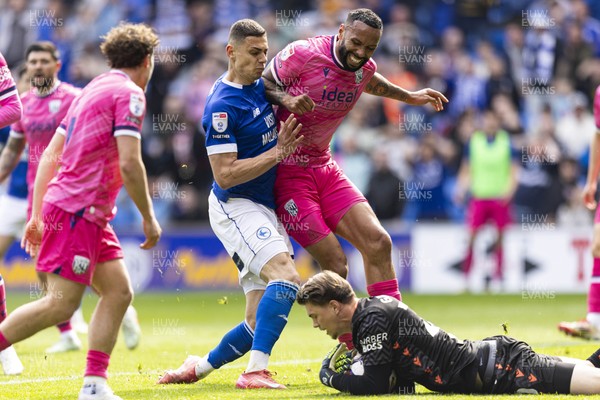 260425 - Cardiff City v West Bromwich Albion - Sky Bet Championship - Yousef Salech of Cardiff City in action against Kyle Bartley of West Brom
