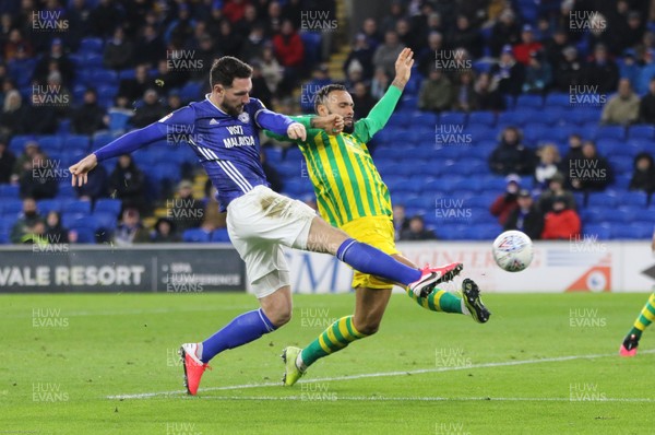 280120 - Cardiff City v West Bromwich Albion, Sky Bet Championship - Sean Morrison of Cardiff City beats Kyle Bartley of West Bromwich Albion as he  puts the cross in to set up goal for Callum Paterson of Cardiff City