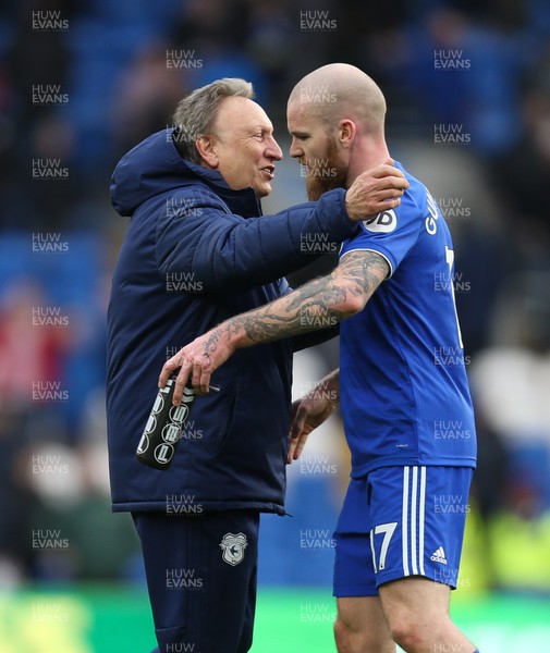 090319 - Cardiff City v West Ham United, Premier League - Cardiff City manager Neil Warnock celebrates with Aron Gunnarsson of Cardiff City at the end of the match