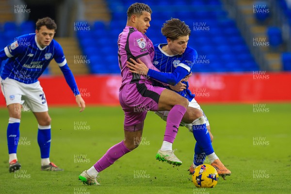 040126 - Cardiff City v Wigan Athletic - Sky Bet League 1 - Cian Ashford of Cardiff City battles for the ball with Raphael Borges Rodrigues of Wigan Athletic