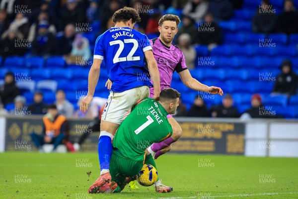 040126 - Cardiff City v Wigan Athletic - Sky Bet League 1 - Yousef Salech of Cardiff City clashes with Sam Tickle of Wigan Athletic