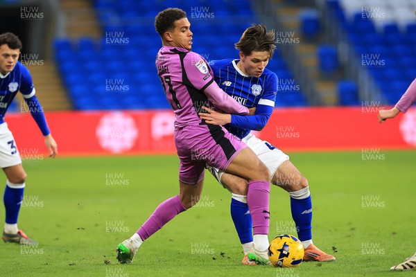 040126 - Cardiff City v Wigan Athletic - Sky Bet League 1 - Cian Ashford of Cardiff City battles for the ball with Raphael Borges Rodrigues of Wigan Athletic