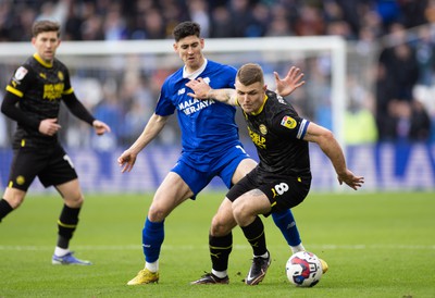 140123 - Cardiff City v Wigan Athletic, EFL Sky Bet Championship - Max Power of Wigan Athletic holds off Callum O'Dowda of Cardiff City