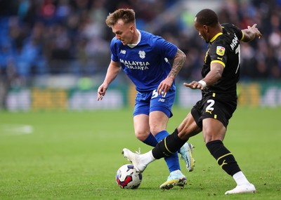 140123 - Cardiff City v Wigan Athletic, EFL Sky Bet Championship - Isaak Davies of Cardiff City takes on Ryan Nyambe of Wigan Athletic