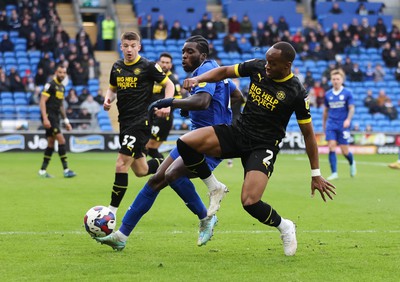 140123 - Cardiff City v Wigan Athletic, EFL Sky Bet Championship - Sheyi Ojo of Cardiff City is challenged by Ryan Nyambe of Wigan Athletic