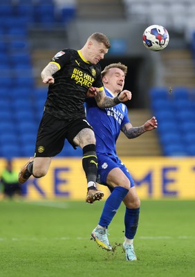 140123 - Cardiff City v Wigan Athletic, EFL Sky Bet Championship - James McClean of Wigan Athletic challenges Isaak Davies of Cardiff City for the ball