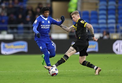 140123 - Cardiff City v Wigan Athletic, EFL Sky Bet Championship - Jaden Philogene of Cardiff City gets away from James McClean of Wigan Athletic