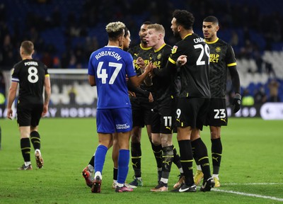 140123 - Cardiff City v Wigan Athletic, EFL Sky Bet Championship - Callum Robinson of Cardiff City and James McClean of Wigan Athletic have a difference of opinions at the end of the match