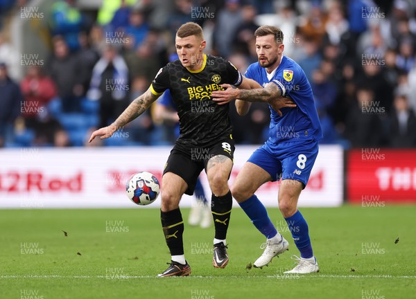 140123 - Cardiff City v Wigan Athletic, EFL Sky Bet Championship - Joe Ralls of Cardiff City and Max Power of Wigan Athletic compete for the ball