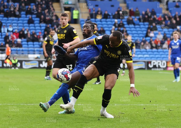 140123 - Cardiff City v Wigan Athletic, EFL Sky Bet Championship - Sheyi Ojo of Cardiff City is challenged by Ryan Nyambe of Wigan Athletic