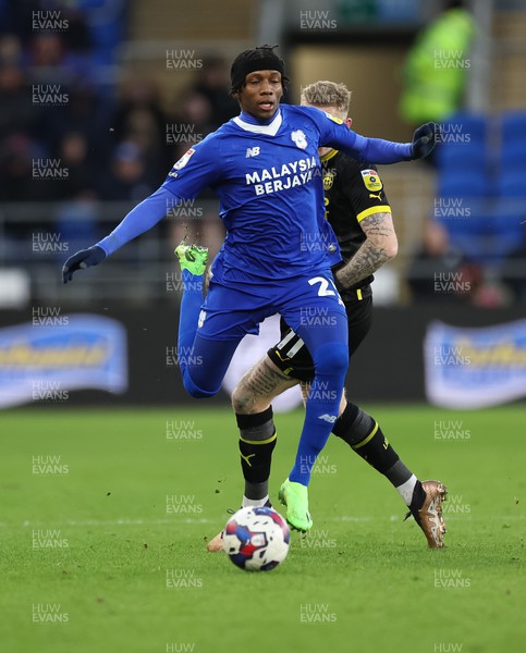 140123 - Cardiff City v Wigan Athletic, EFL Sky Bet Championship - Jaden Philogene of Cardiff City gets away from James McClean of Wigan Athletic
