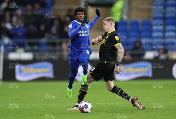 140123 - Cardiff City v Wigan Athletic, EFL Sky Bet Championship - Jaden Philogene of Cardiff City gets away from James McClean of Wigan Athletic