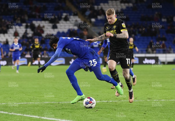 140123 - Cardiff City v Wigan Athletic, EFL Sky Bet Championship - Jaden Philogene of Cardiff City takes on James McClean of Wigan Athletic