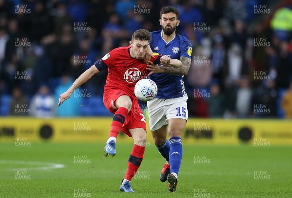 150220 - Cardiff City v Wigan Athletic - SkyBet Championship - Joe Williams of Wigan is challenged by Marlon Pack of Cardiff City