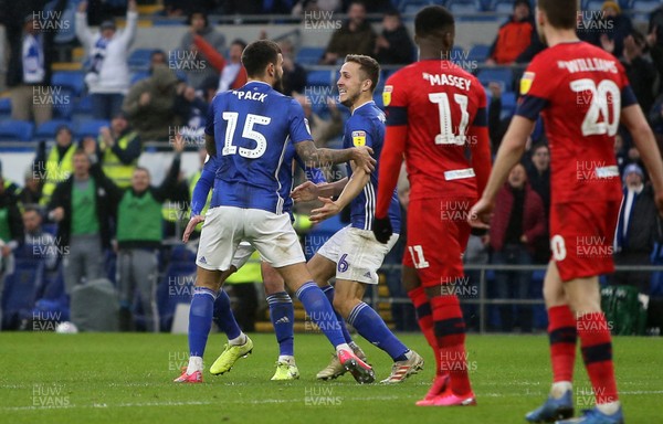 150220 - Cardiff City v Wigan Athletic - SkyBet Championship - Marlon Pack of Cardiff City celebrates scoring a goal with team mates