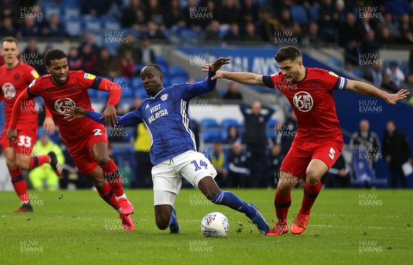 150220 - Cardiff City v Wigan Athletic - SkyBet Championship - Albert Adomah of Cardiff City is tackled by Sam Morsy of Wigan