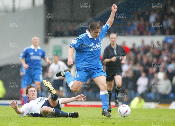 260403 - Cardiff City v Wigan Athletic - Division Two - Cardiff's Gareth Ainsworth breaks away