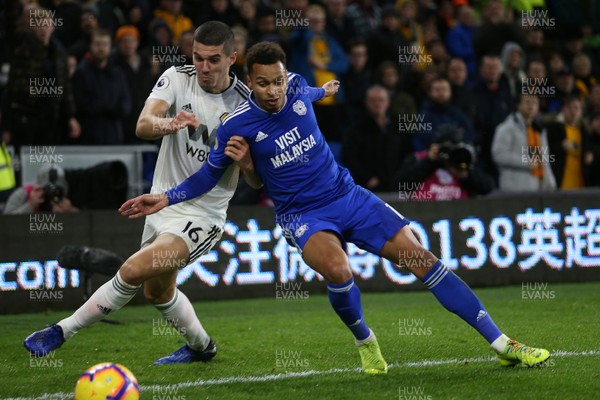 301118 - Cardiff City v Wolverhampton Wanderers - Premier League - Josh Murphy of Cardiff City is tackled by Conor Coady of Wolves