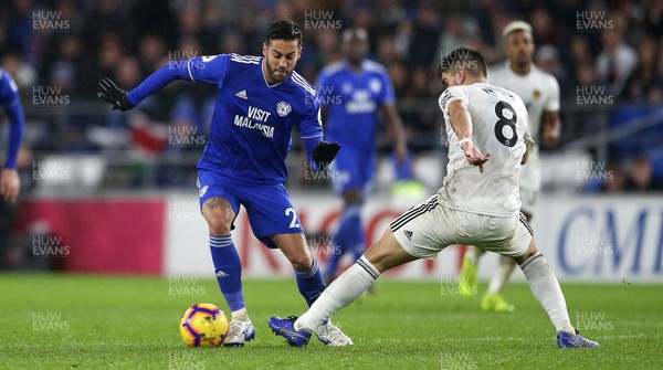 301118 - Cardiff City v Wolverhampton Wanderers - Premier League - V�ctor Camarasa of Cardiff City is tackled by Ruben Neves of Wolves