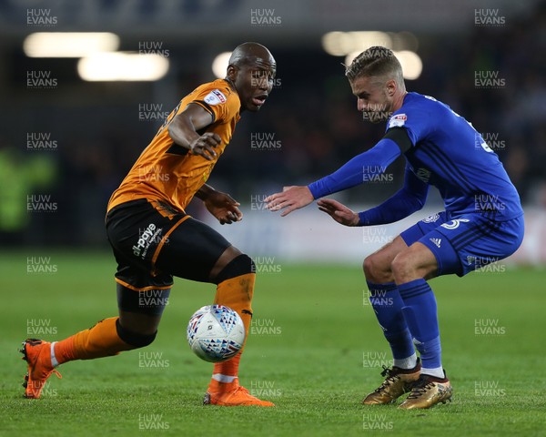 060418 - Cardiff City v Wolverhampton Wanderers - SkyBet Championship - Benik Afobe of Wolves is tackled by Joe Bennett of Cardiff City