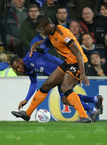 060418 - Cardiff City v Wolverhampton Wanderers, Sky Bet Championship - Junior Hoilett of Cardiff City is challenged by Willy Boly of Wolves
