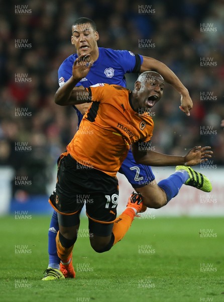 060418 - Cardiff City v Wolverhampton Wanderers, Sky Bet Championship - Benik Afobe of Wolves is brought down by Craig Bryson of Cardiff City