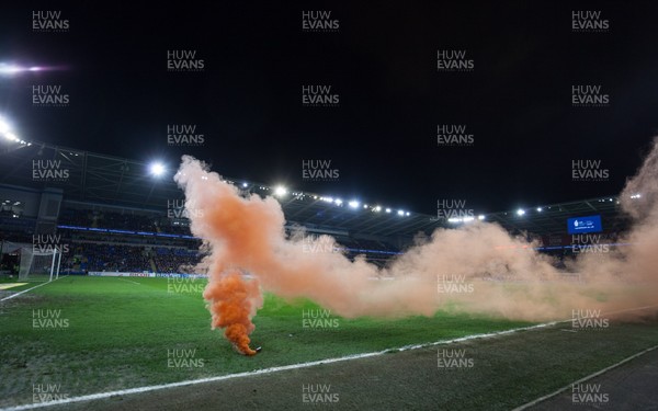 060418 - Cardiff City v Wolverhampton Wanderers, Sky Bet Championship - A smoke canister is thrown onto the pitch after Ruben Neves of Wolves scores goal
