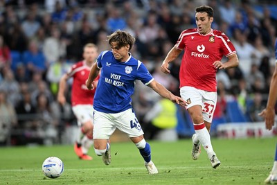 170826 - Cardiff City v Wrexham - Sky Bet Championship - Cian Ashford of Cardiff City is challenged by Matthew James of Wrexham