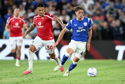 170826 - Cardiff City v Wrexham - Sky Bet Championship - Cian Ashford of Cardiff City is challenged by Danny Imray of Wrexham