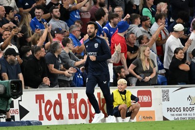170826 - Cardiff City v Wrexham - Sky Bet Championship - Brian Barry-Murphy, Cardiff City Manager runs down the touchline in celebration after Rubin Colwill of Cardiff City scores a goal to equalise there game in the last seconds
