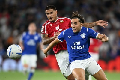 170826 - Cardiff City v Wrexham - Sky Bet Championship - Danny Imray of Wrexham is challenged by Joel Colwill of Cardiff City