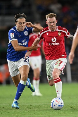 170826 - Cardiff City v Wrexham - Sky Bet Championship - Joel Colwill of Cardiff City is challenged by Lewis O'Brien of Wrexham