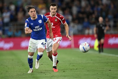 170826 - Cardiff City v Wrexham - Sky Bet Championship - Cian Ashford of Cardiff City is challenged by George Thomason of Wrexham