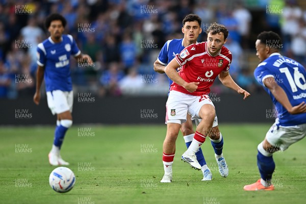 170826 - Cardiff City v Wrexham - Sky Bet Championship - Zak Vyner of Wrexham is challenged by Alex Robertson of Cardiff City