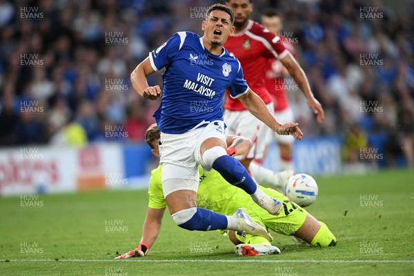 170826 - Cardiff City v Wrexham - Sky Bet Championship - Yousef Salech of Cardiff City is tackled by Anthony Patterson of Wrexham