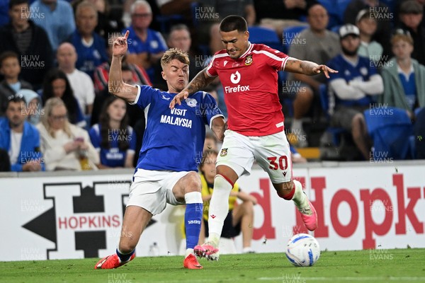 170826 - Cardiff City v Wrexham - Sky Bet Championship - Joel Bagan of Cardiff City is challenged by Danny Imray of Wrexham