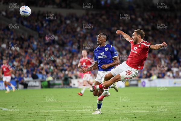 170826 - Cardiff City v Wrexham - Sky Bet Championship - Ben Sheaf of Wrexham is challenged by Gabriel Osho of Cardiff City