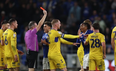170326 - Cardiff `City v Wycombe Wanderers, EFL Sky Bet League 1 - Gabiel Osho of Cardiff City is shown a red card for the tackle on Ewan Henderson of Wycombe Wanderers
