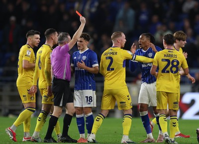 170326 - Cardiff `City v Wycombe Wanderers, EFL Sky Bet League 1 - Gabiel Osho of Cardiff City is shown a red card for the tackle on Ewan Henderson of Wycombe Wanderers