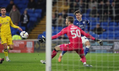 170326 - Cardiff `City v Wycombe Wanderers, EFL Sky Bet League 1 - Cian Ashford of Cardiff City looks on his shot beats Wycombe Wanderers goalkeeper Will Norris but goes wide of the goal