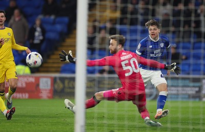 170326 - Cardiff `City v Wycombe Wanderers, EFL Sky Bet League 1 - Cian Ashford of Cardiff City looks on his shot beats Wycombe Wanderers goalkeeper Will Norris but goes wide of the goal