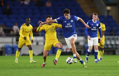170326 - Cardiff `City v Wycombe Wanderers, EFL Sky Bet League 1 - Rubin Colwill of Cardiff City competes with Caolan Boyd-Munce of Wycombe Wanderers for the ball