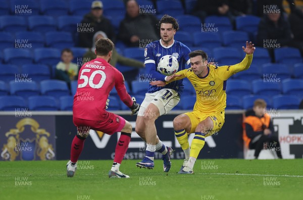 170326 - Cardiff `City v Wycombe Wanderers, EFL Sky Bet League 1 - Daniel Harvie of Wycombe Wanderers and Ollie Tanner of Cardiff City compete for the ball as Wycombe Wanderers goalkeeper Will Norris closes in