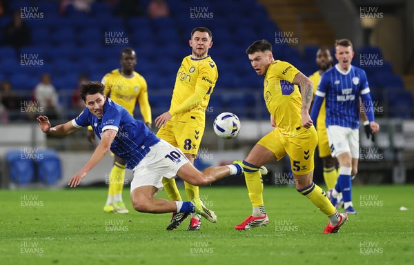 170326 - Cardiff `City v Wycombe Wanderers, EFL Sky Bet League 1 - Rubin Colwill of Cardiff City competes with Caolan Boyd-Munce of Wycombe Wanderers and Aaron Morley of Wycombe Wanderers for the ball