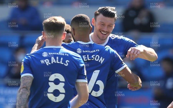 240421 Cardiff City v Wycombe Wanderers, Sky Bet Championship - Kieffer Moore of Cardiff City is congratulated by Curtis Nelson of Cardiff City after scoring the first goal