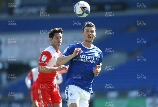 240421 Cardiff City v Wycombe Wanderers, Sky Bet Championship - Kieffer Moore of Cardiff City plays the ball forward