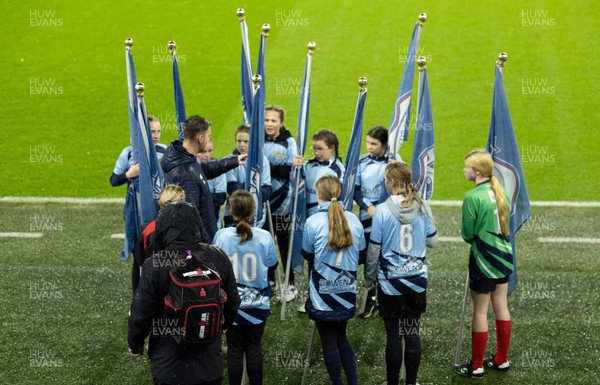 161122 - Cardiff City Women v Abergavenny Women - The flag bearers ahead of the match at the Cardiff City Stadium