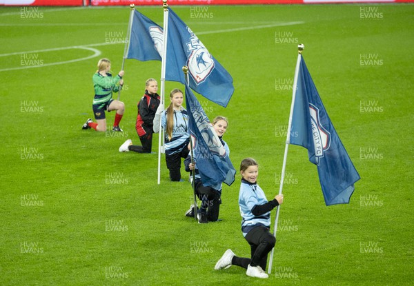161122 - Cardiff City Women v Abergavenny Women - The flag bearers ahead of the match at the Cardiff City Stadium