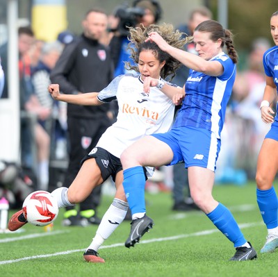 140424 - Cardiff City Women v Swansea City Women - Genero Adran Trophy Final - Ffion Price of Cardiff City Women is challenged by Monet Legall of Swansea City Women