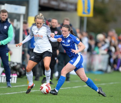 140424 - Cardiff City Women v Swansea City Women - Genero Adran Trophy Final - Ffion Price of Cardiff City Women is challenged by Ellie Lake of Swansea City Women 